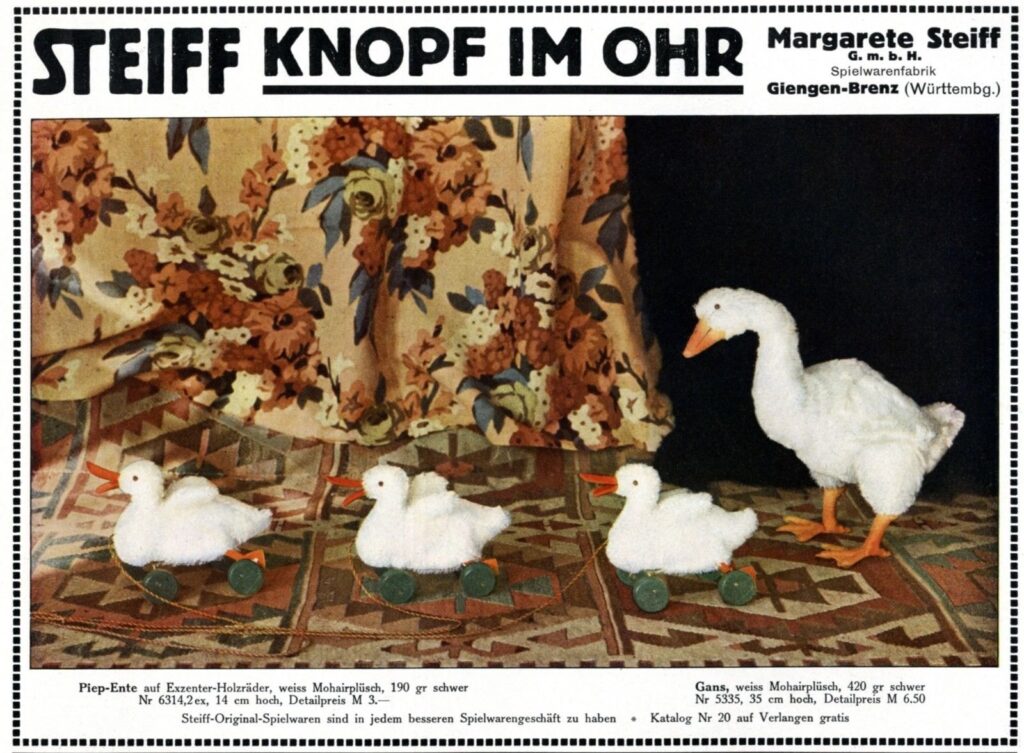 Steiff advertisement from 1914 showing white toy ducks on wheels and a large toy goose under the heading Knopf im Ohr
